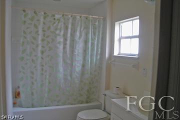8164 Matanzas Road Fort Myers, FL 33967 - Photo 7 of 9 a bathroom with a sink and a toilet