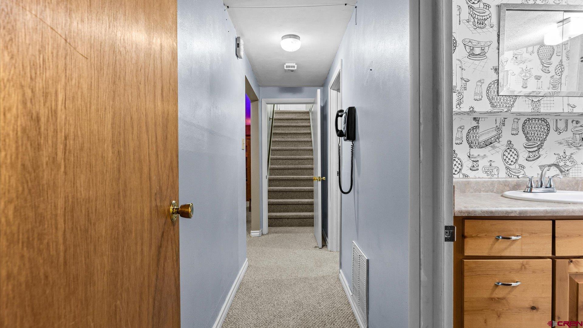 1424 Dover Road Montrose, CO 81401 - Photo 16 of 44 a view of a hallway with closet