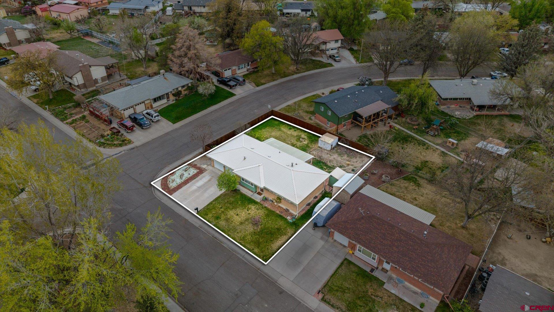1424 Dover Road Montrose, CO 81401 - Photo 31 of 44 an aerial view of a house with a garden