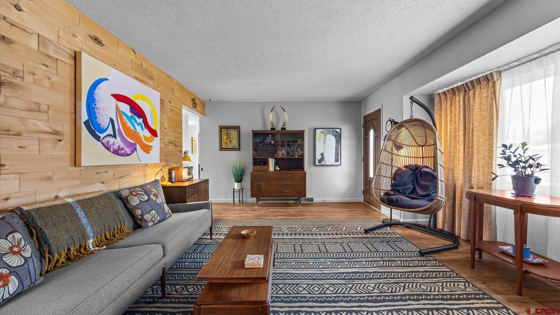 1424 Dover Road Montrose, CO 81401 - Photo 6 of 44 a living room with furniture and a fireplace