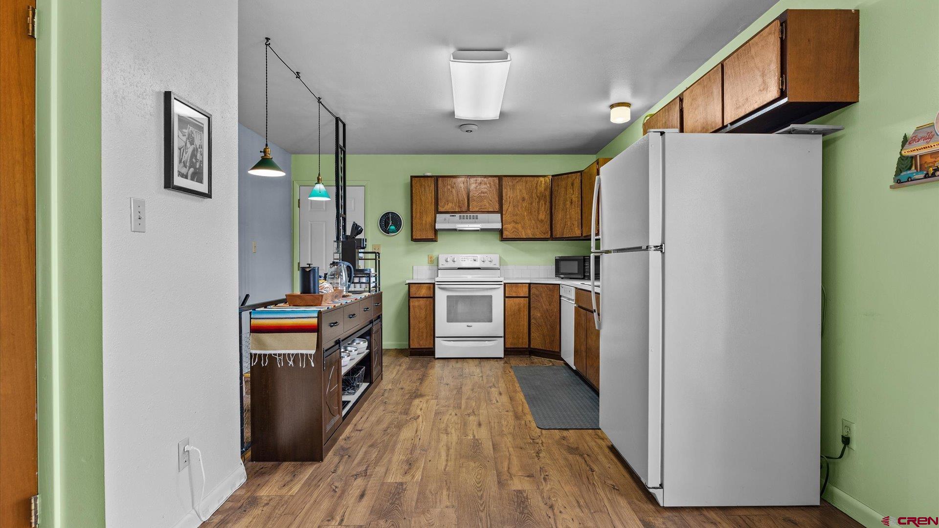 1424 Dover Road Montrose, CO 81401 - Photo 8 of 44 a kitchen with stainless steel appliances a refrigerator and a stove
