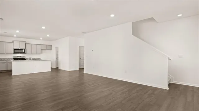 a view of kitchen with wooden floor
