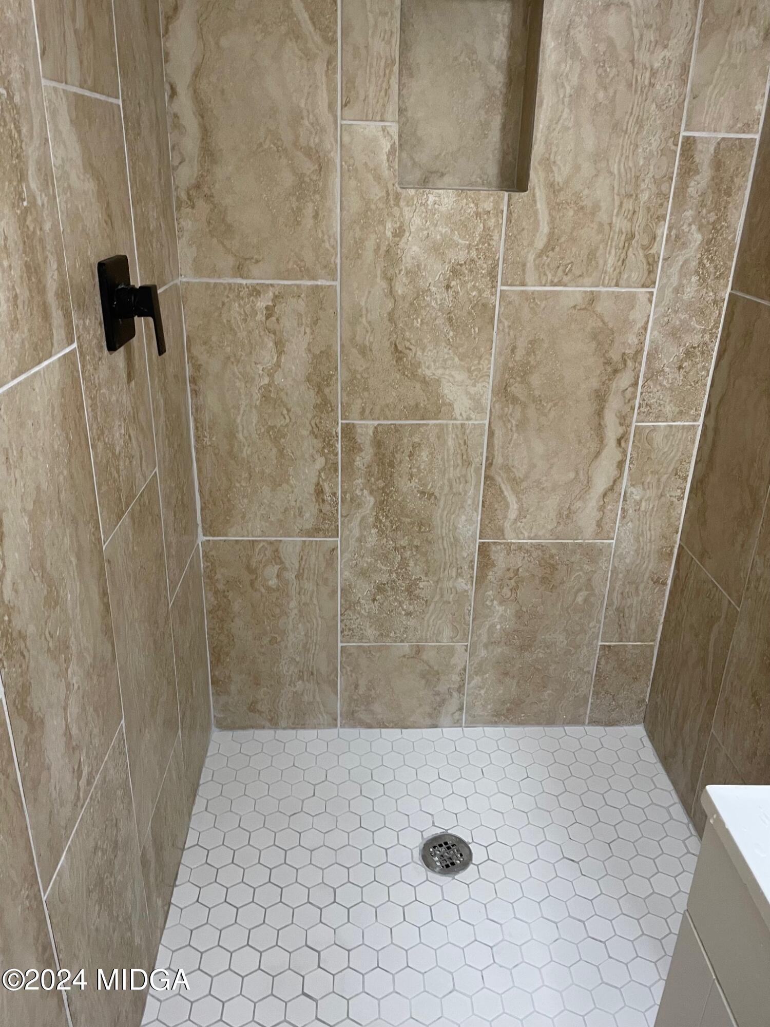 2069 Manson Road Macon, GA 31217 - Photo 12 of 15 a bathroom with a shower