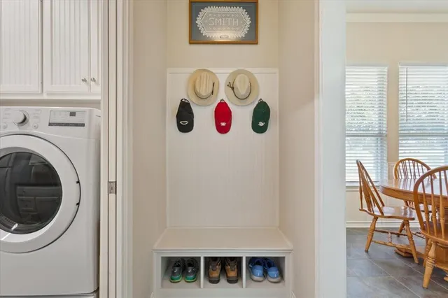 a view of a livingroom with furniture and windows