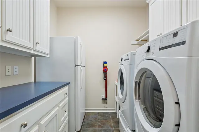 a bedroom with a bed and a desk