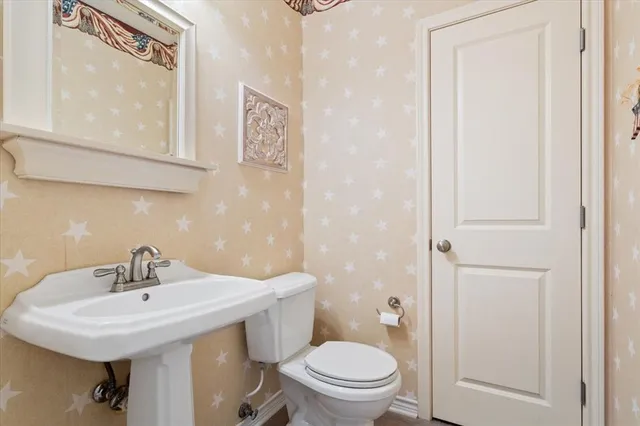 a view of a hallway with windows