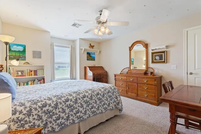 a bathroom with a sink vanity and mirror