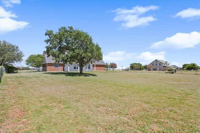a picture of a bathroom with a shower