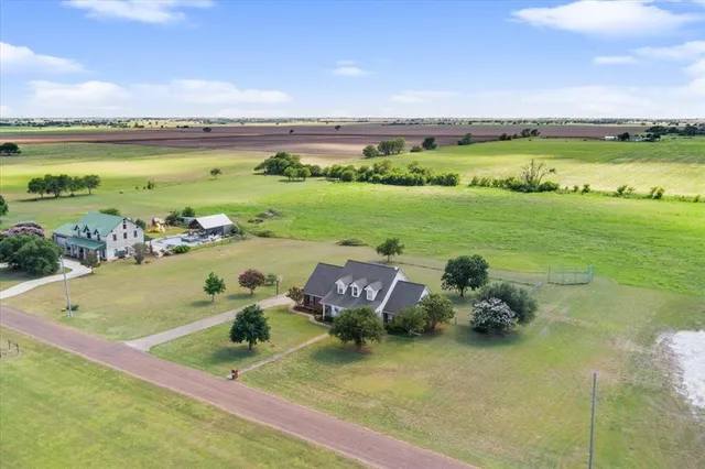 a view of a lake with a yard