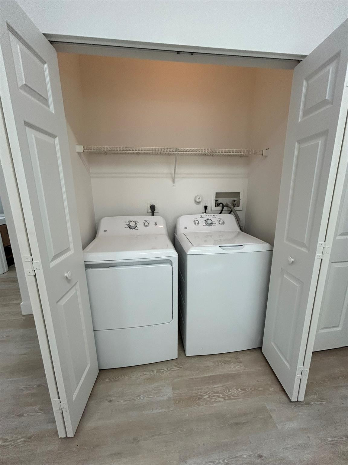 16223 Emerald Cove Road, Unit 16223 Weston, FL 33331 - Photo 16 of 38 a utility room with dryer and washer