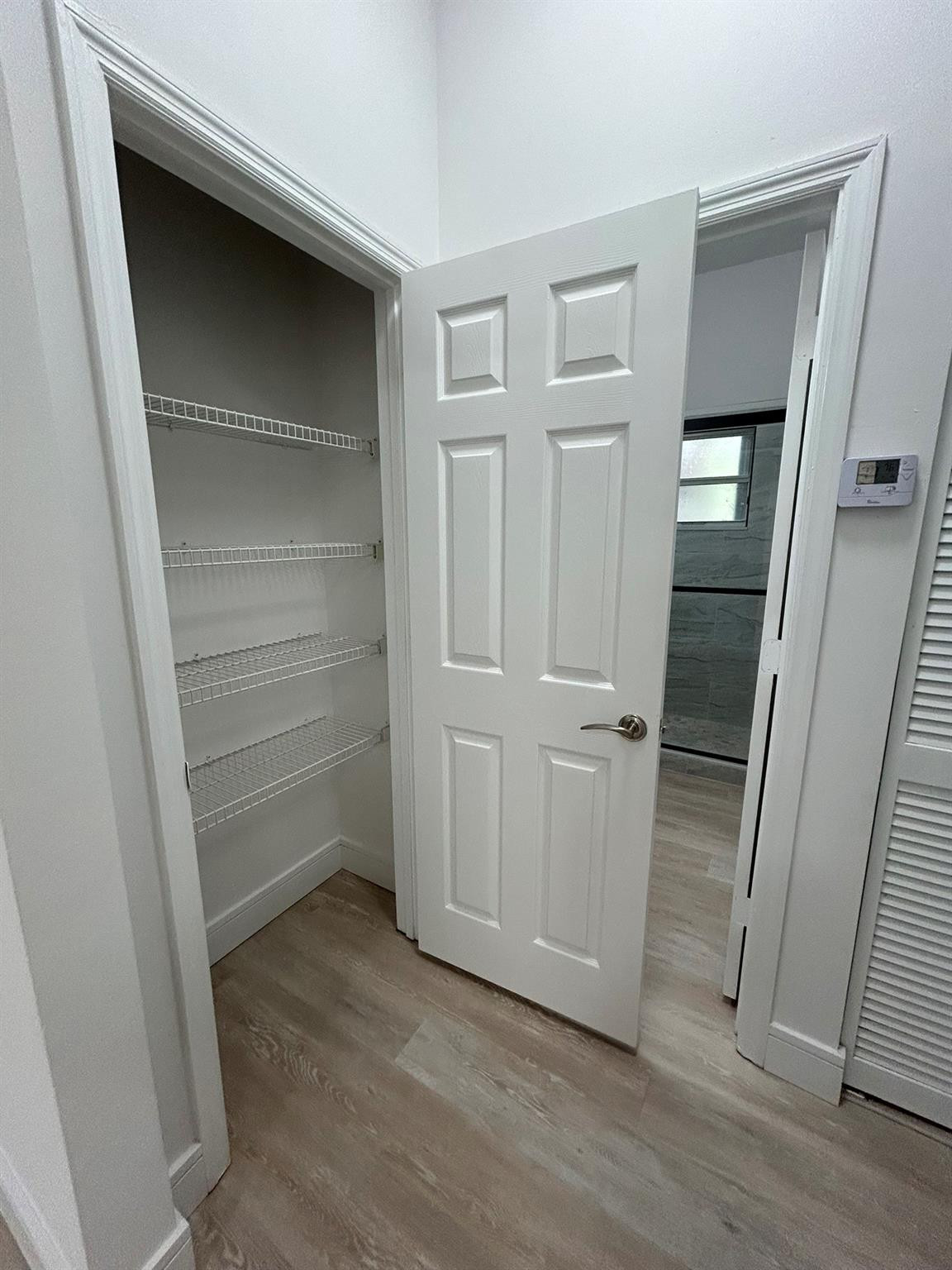 16223 Emerald Cove Road, Unit 16223 Weston, FL 33331 - Photo 22 of 38 a view of a room with wooden floor