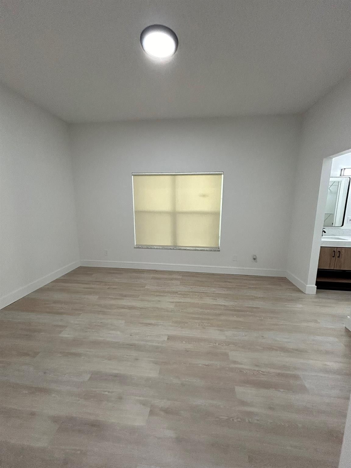 16223 Emerald Cove Road, Unit 16223 Weston, FL 33331 - Photo 23 of 38 a view of an empty room with a window