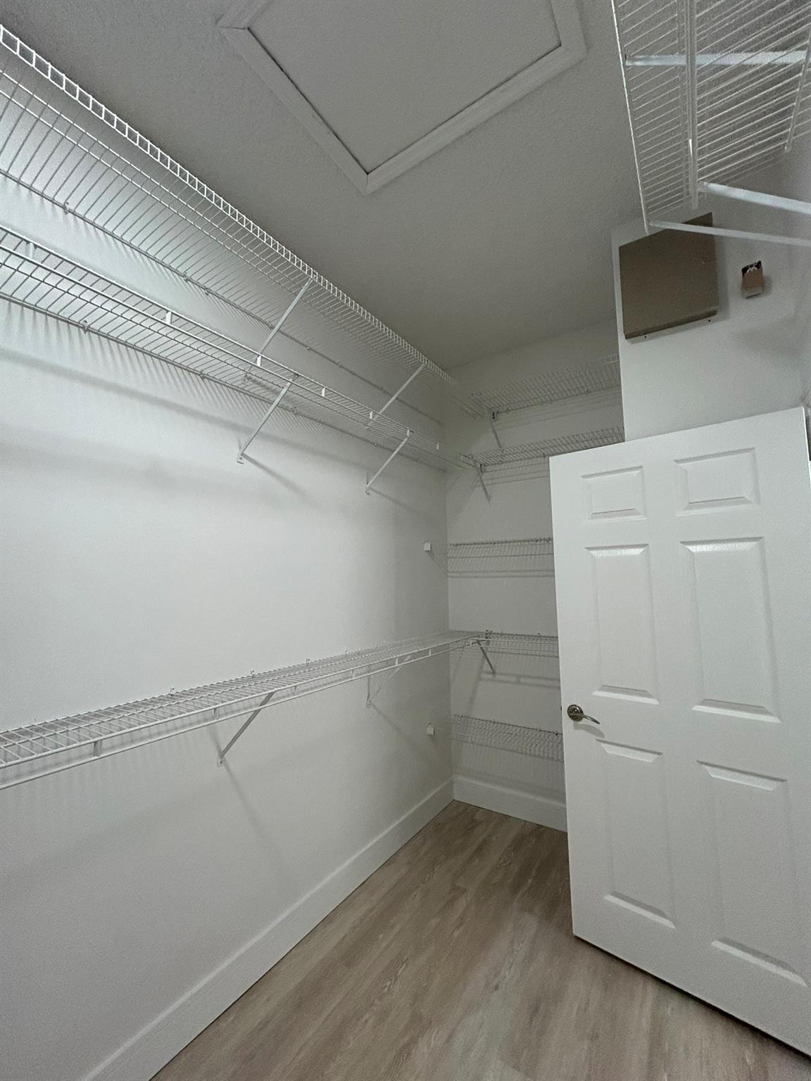 16223 Emerald Cove Road, Unit 16223 Weston, FL 33331 - Photo 27 of 38 a view of a room with racks on the wall