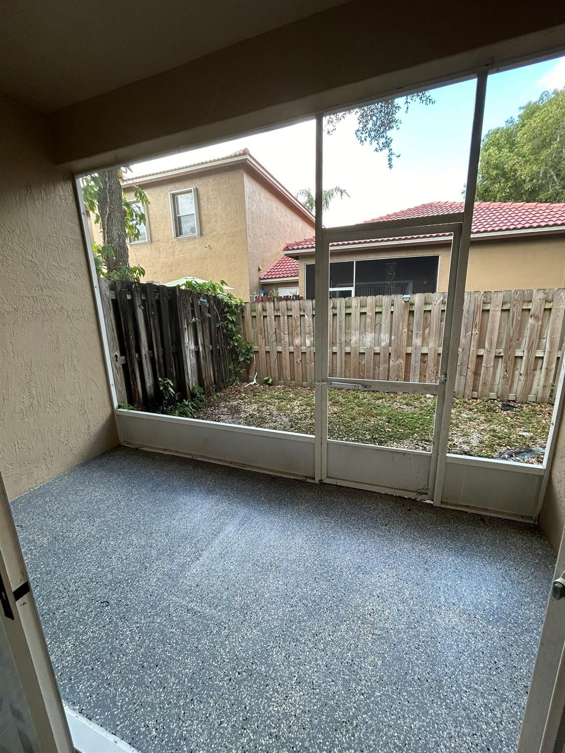 16223 Emerald Cove Road, Unit 16223 Weston, FL 33331 - Photo 30 of 38 a view of front door with outdoor space
