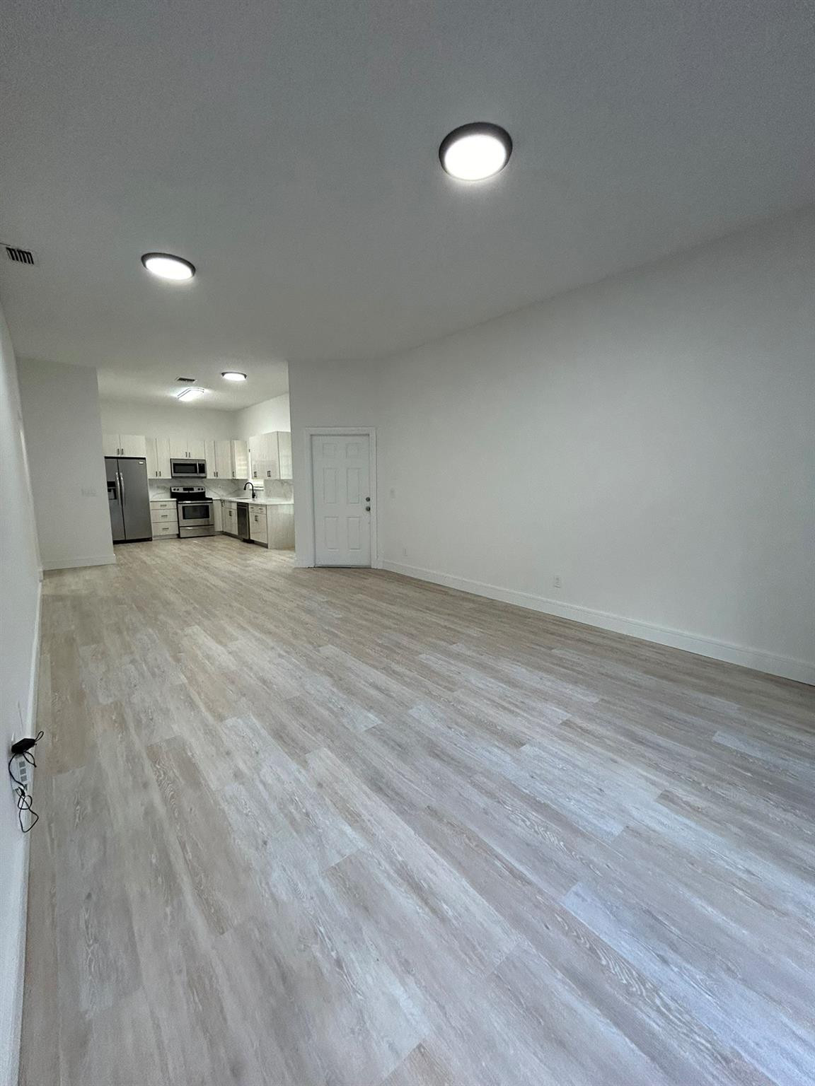 16223 Emerald Cove Road, Unit 16223 Weston, FL 33331 - Photo 8 of 38 a view of a livingroom with furniture and wooden floor