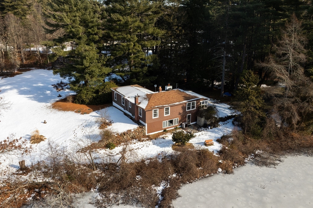 115 Kennedy Road Stoughton, MA 02072 - Photo 5 of 42 a backyard of a house with large trees