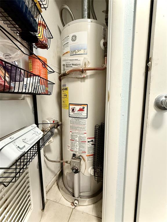 1206 Mildred Lane Benbrook, TX 76126 - Photo 19 of 38 Hot water heater