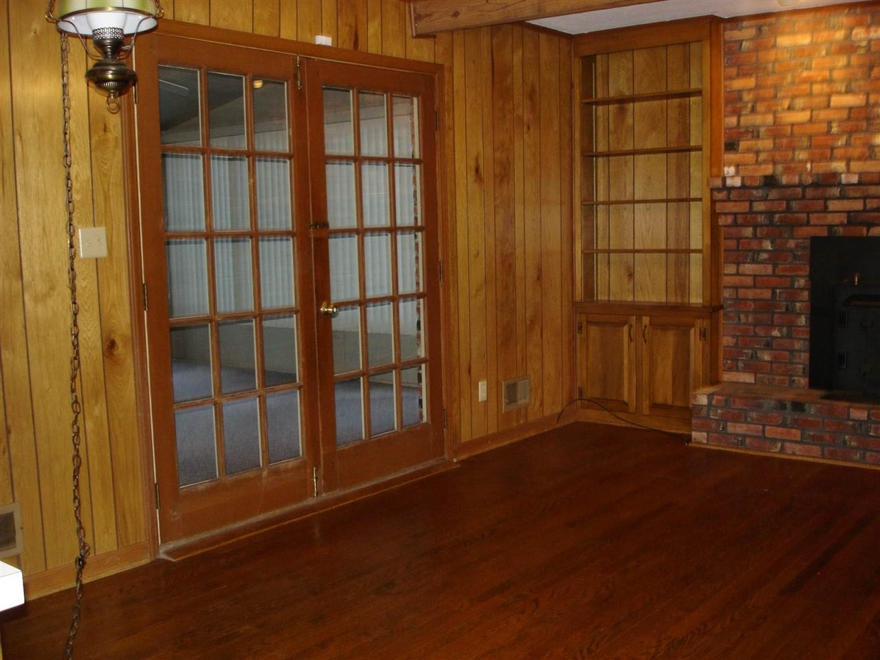 4516 Oak Park Road Raleigh, NC 27612 - Photo 4 of 17 Spacious Family Room Opens to All-Weather Sun Room Family Room