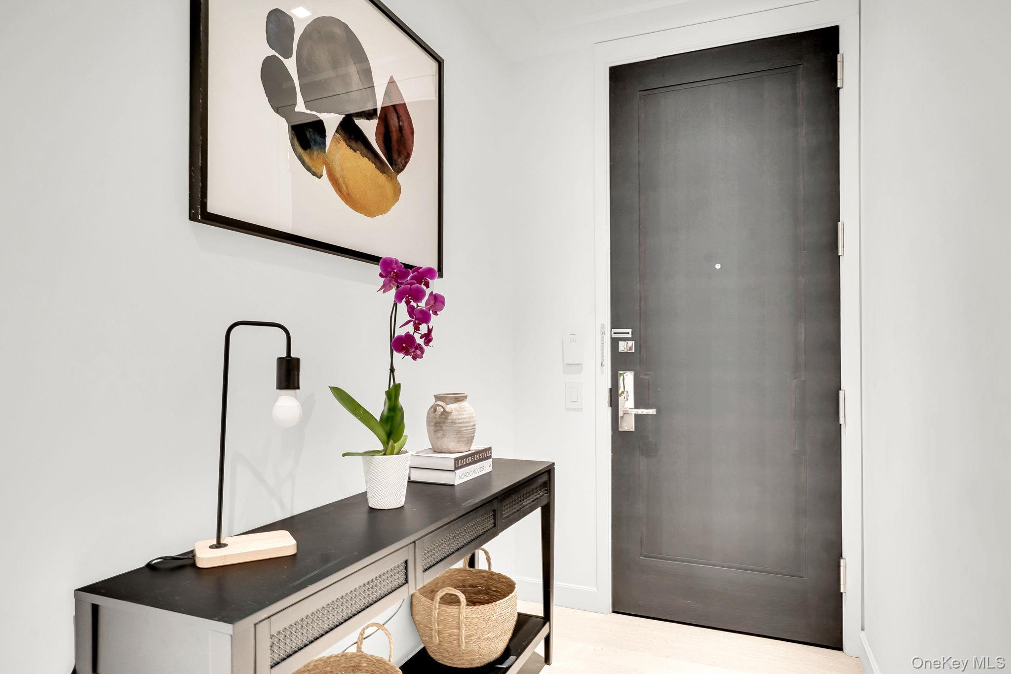 a table with a sink and cabinets