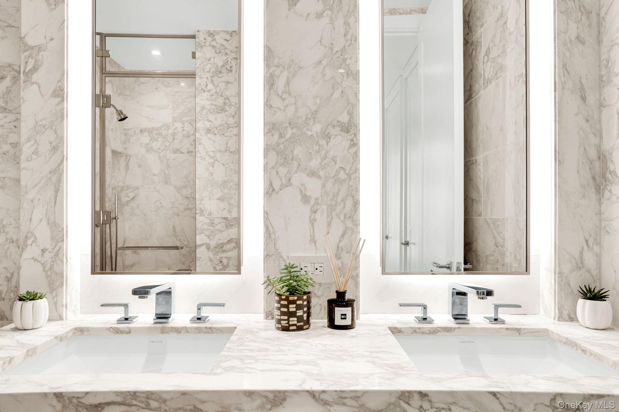 138 East 50th Street, Unit 26C Manhattan, NY 10022 - Photo 23 of 31 a bathroom with a tub sink and a window