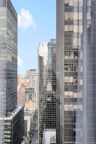 a view of a city with tall buildings