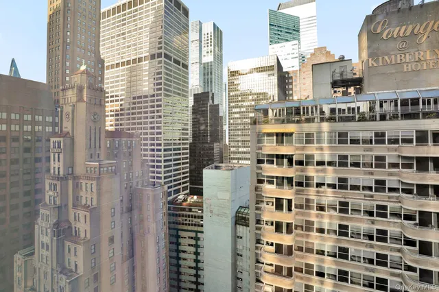 a view of city with tall buildings