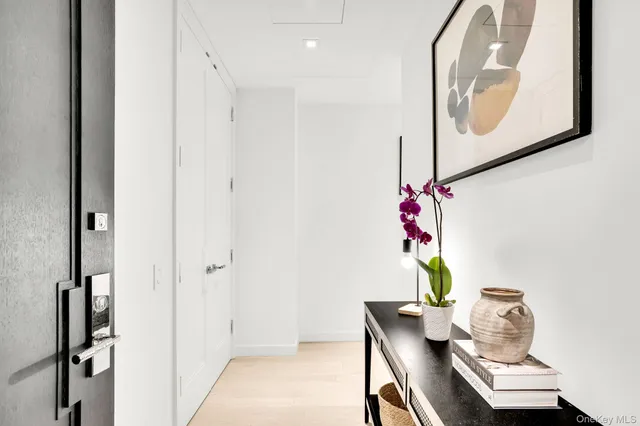 a workspace with furniture and mirror