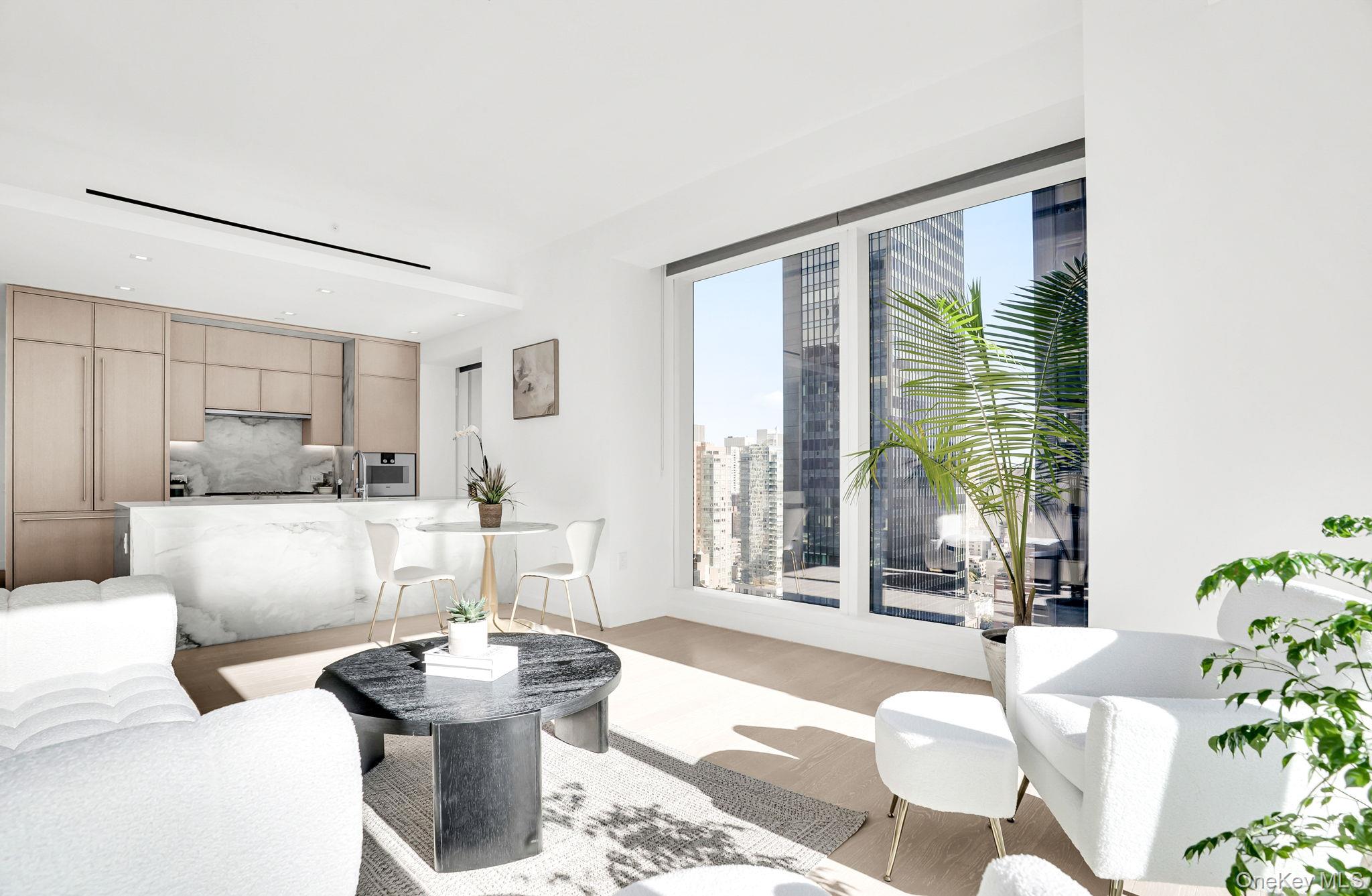 138 East 50th Street, Unit 26C Manhattan, NY 10022 - Photo 9 of 31 a living room with furniture and a large window