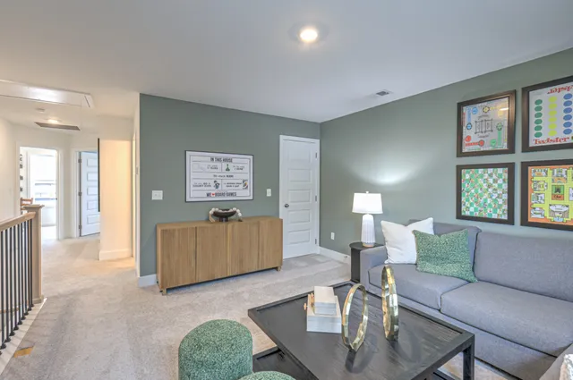 a bedroom with a bed and a lamp