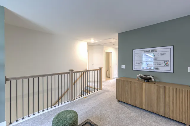 a spacious bedroom with a bed and a couch