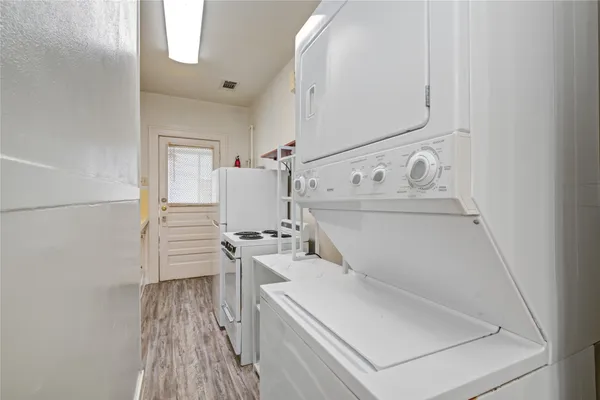 a view of a kitchen with a sink