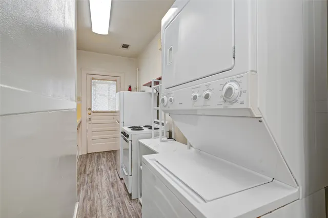 a view of a kitchen with a sink