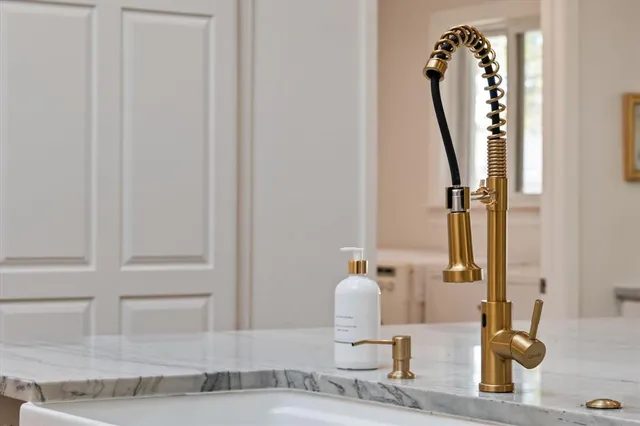 a bathroom with sink and mirror