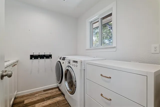 a utility room with dryer and washer