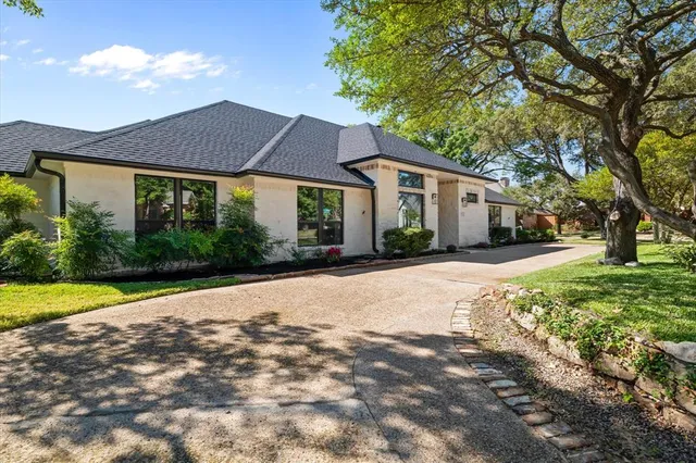 a house with yard in front of it
