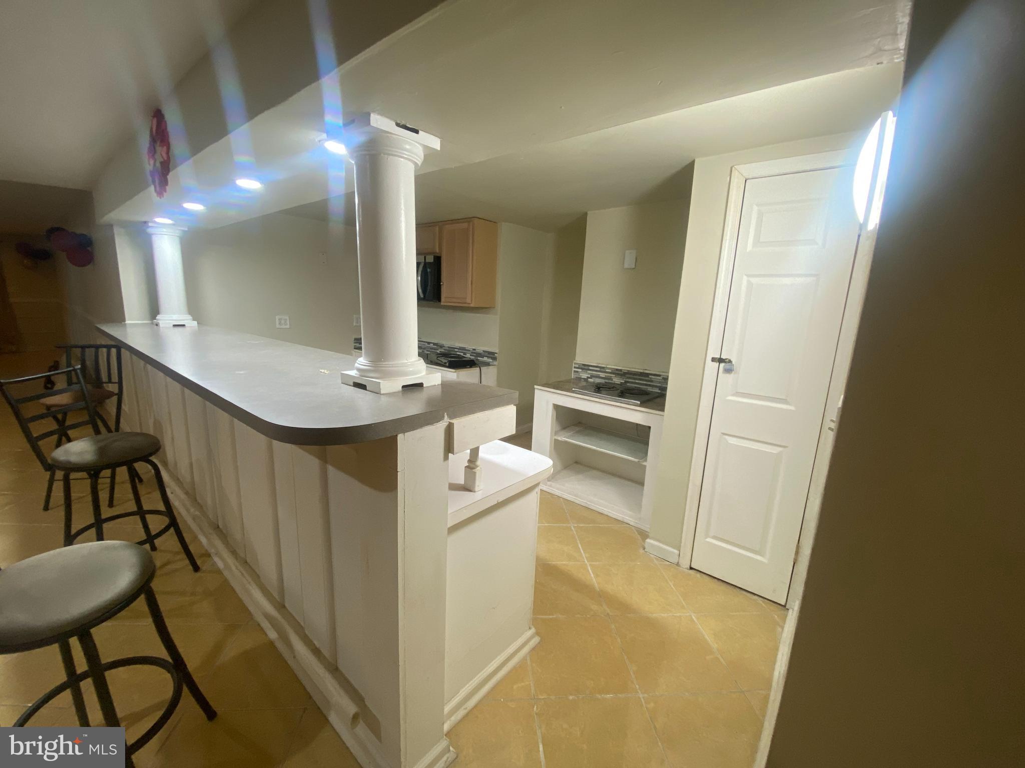 14606 Dewey Ridge Court Bowie, MD 20721 - Photo 4 of 11 a bathroom with a sink a toilet and mirror