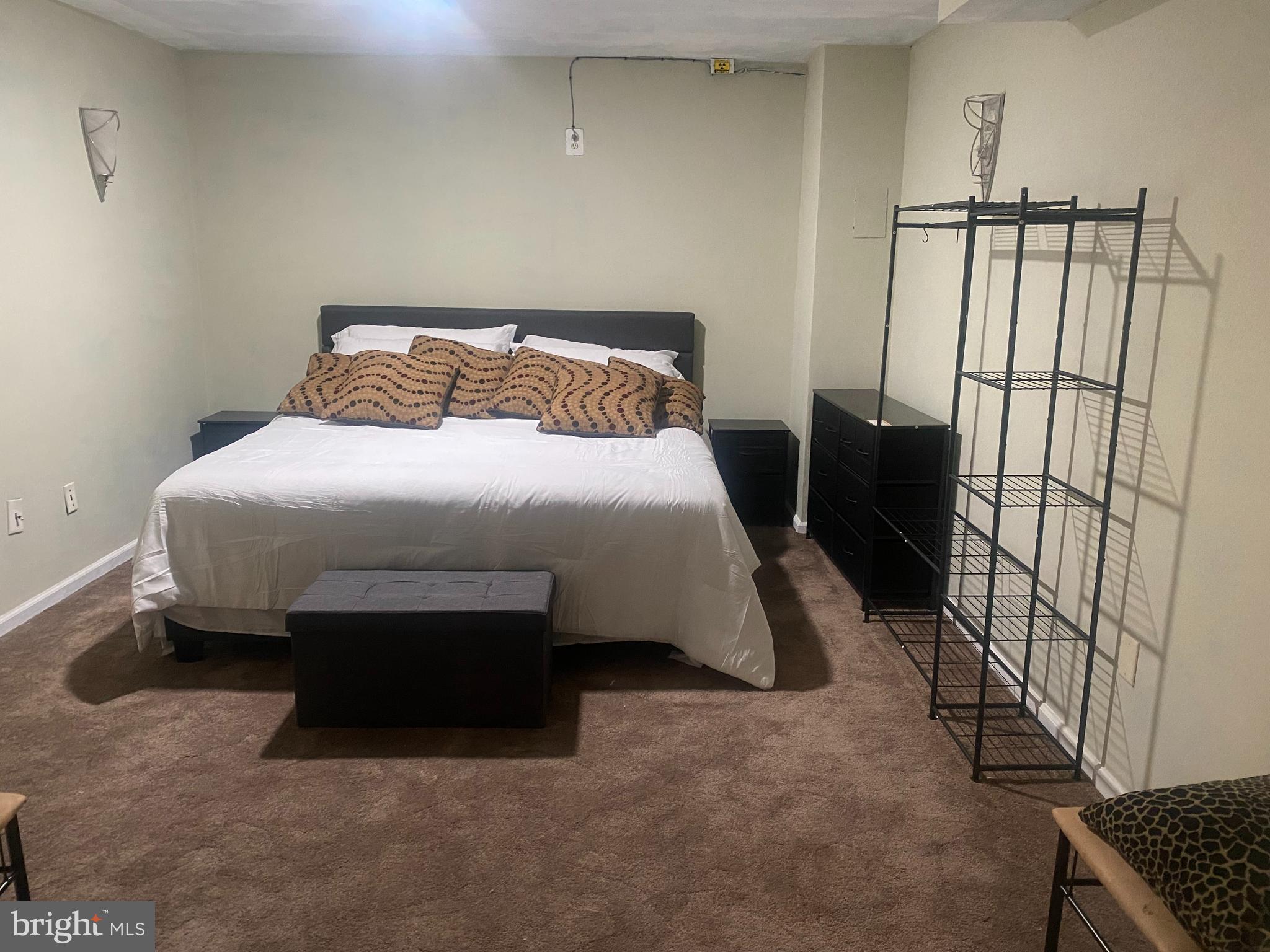 14606 Dewey Ridge Court Bowie, MD 20721 - Photo 7 of 11 a bedroom with a bed and a window