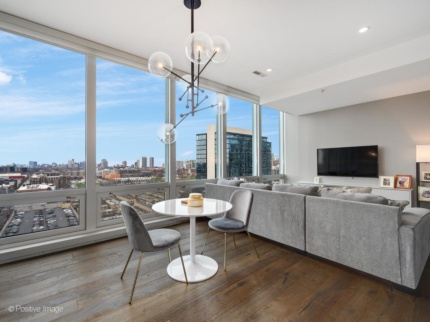 500 West Superior Street, Unit 1202 Chicago, IL 60654 - Photo 7 of 29 a living room with furniture kitchen view and a large window
