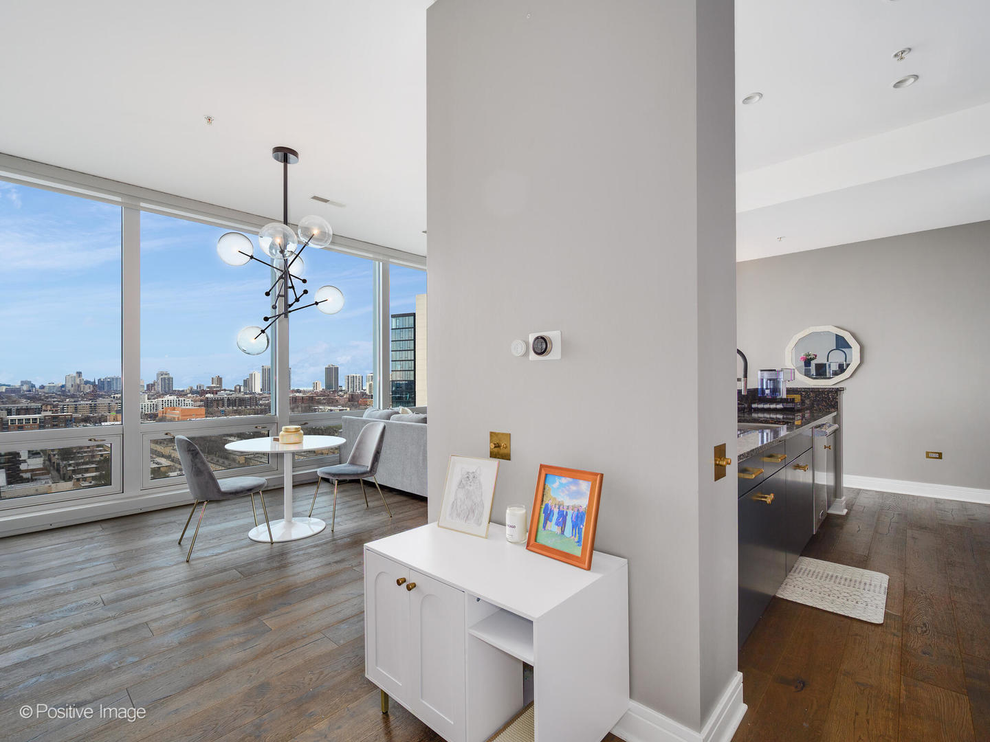 500 West Superior Street, Unit 1202 Chicago, IL 60654 - Photo 9 of 29 a view of a workspace with furniture and a gym equipment