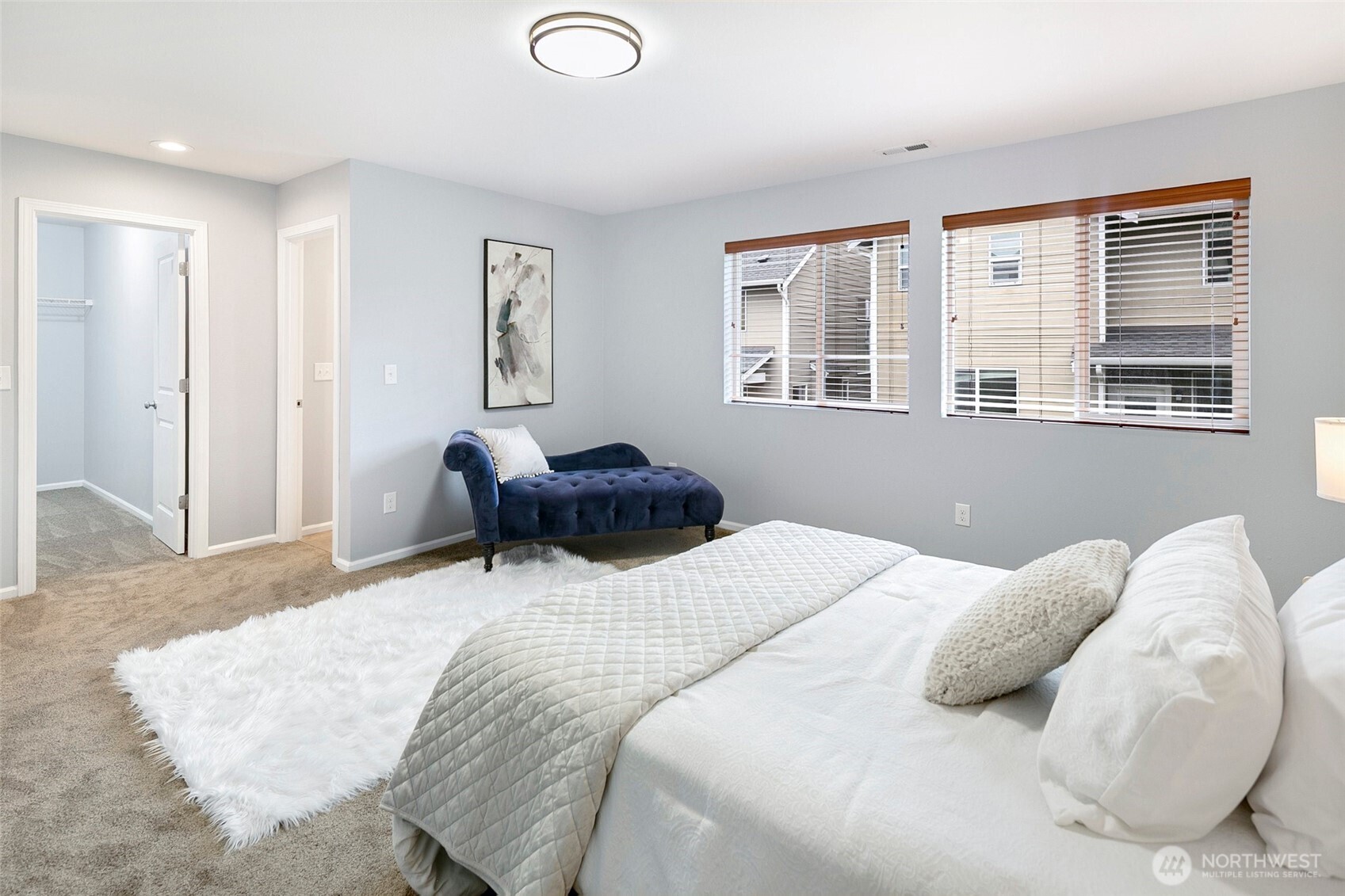 3931 177th Street Southeast Bothell, WA 98012 - Photo 20 of 39 a bedroom with a bed and wooden floor
