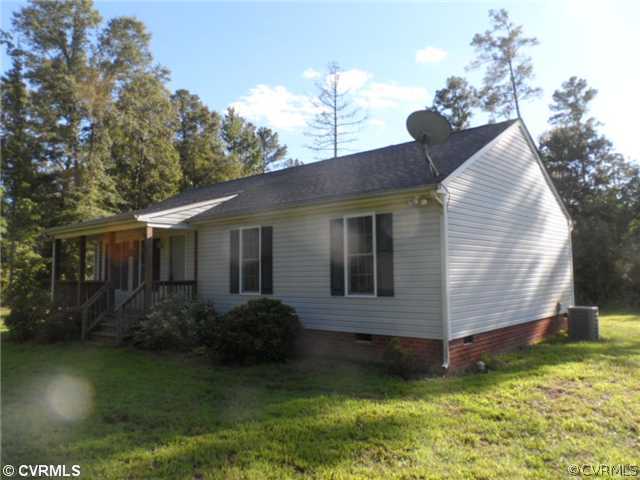 4166 Wakema Road West Point, VA 23181 - Photo 1 of 10 a view of a house with a yard