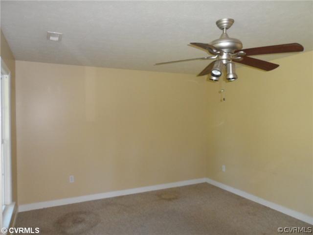 4166 Wakema Road West Point, VA 23181 - Photo 2 of 10 a view of a small space with a fan