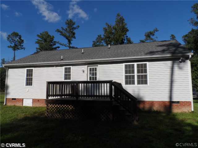 4166 Wakema Road West Point, VA 23181 - Photo 10 of 10 a view of a house with a deck