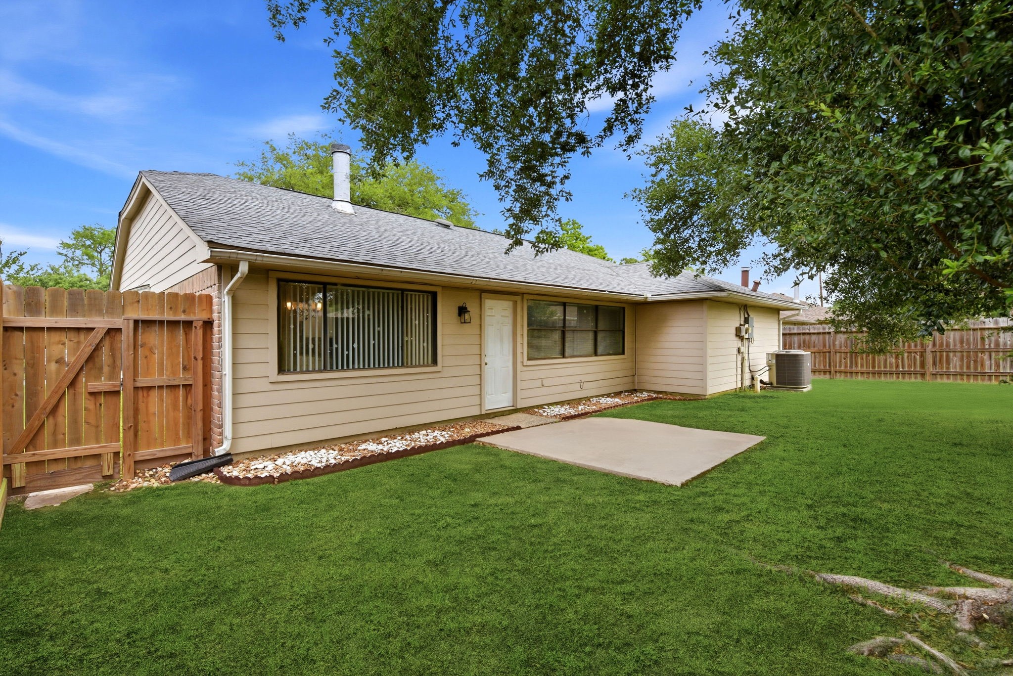 21330 Golden Dove Drive Spring, TX 77388 - Photo 25 of 29 Step outside to your fully fenced, private backyard—a fantastic blank canvas ready for summer BBQs!