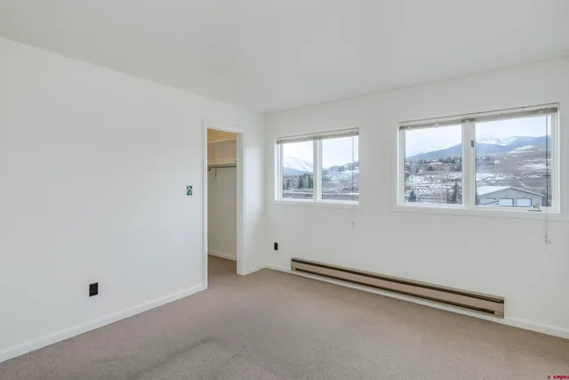 an empty room with windows