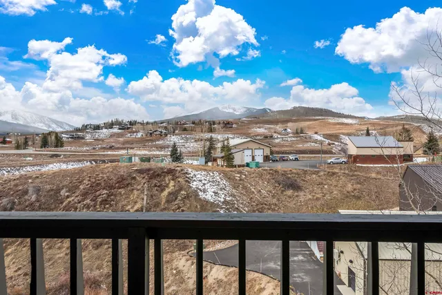 a view of an ocean and a mountain