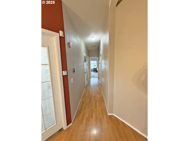 a bedroom with a bed and a table in it