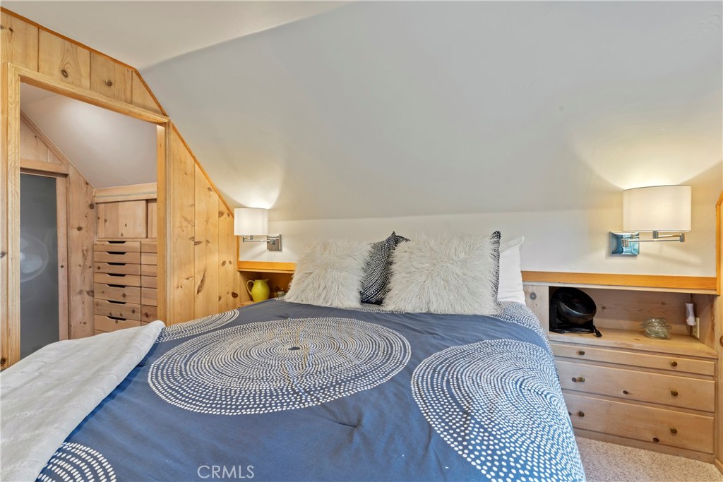 309 Castle Gate Road Lake Arrowhead, CA 92352 - Photo 32 of 58 a bedroom with a bed and dresser