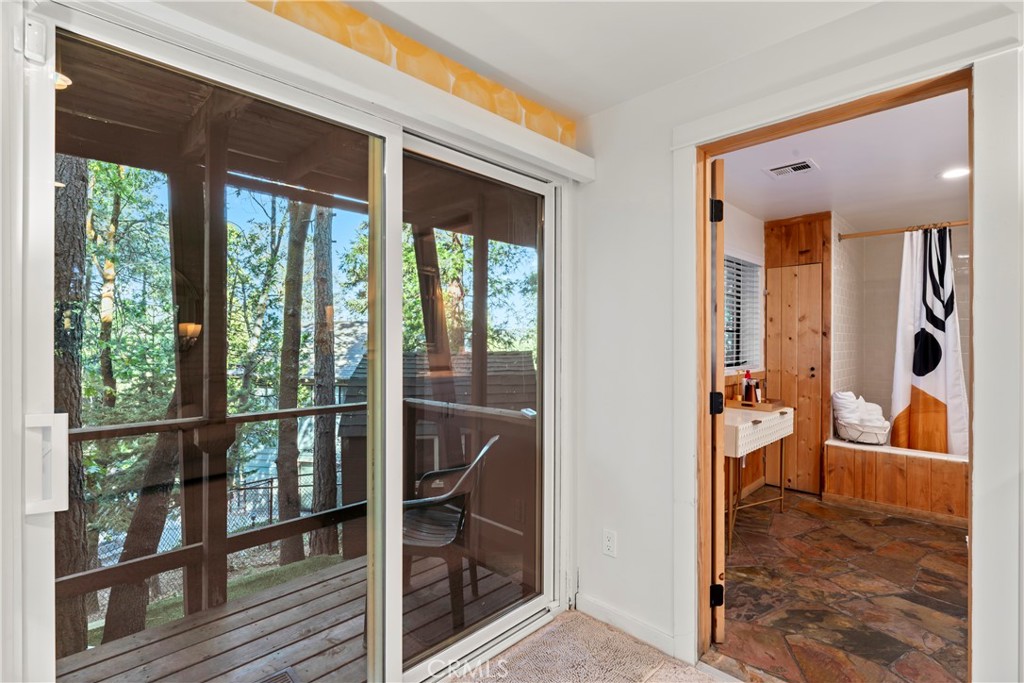 309 Castle Gate Road Lake Arrowhead, CA 92352 - Photo 43 of 58 a view of a porch with wooden floor and outer view