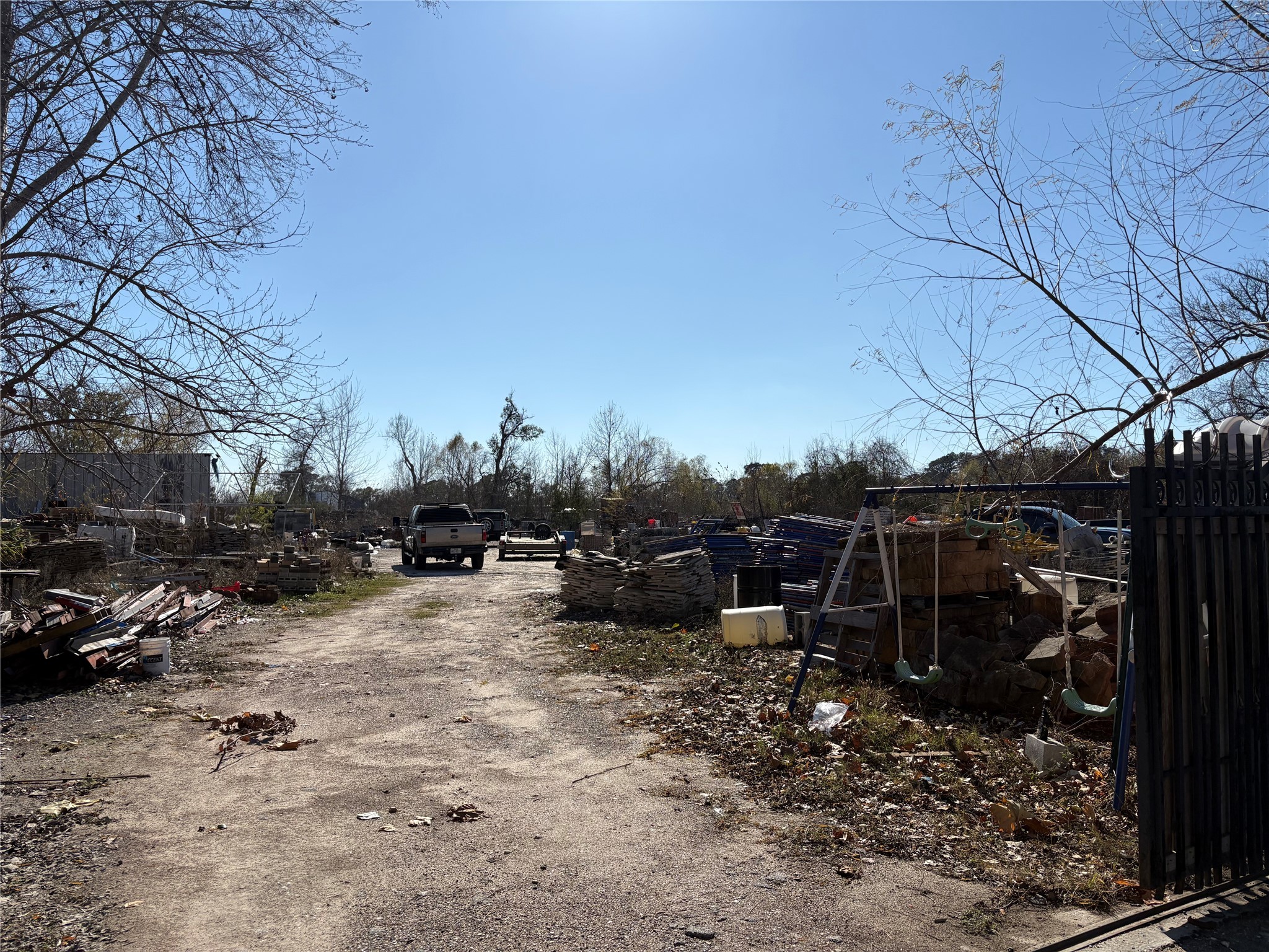 1227 West Little York Road Houston, TX 77091 - Photo 2 of 3 a view of a yard with wooden fence